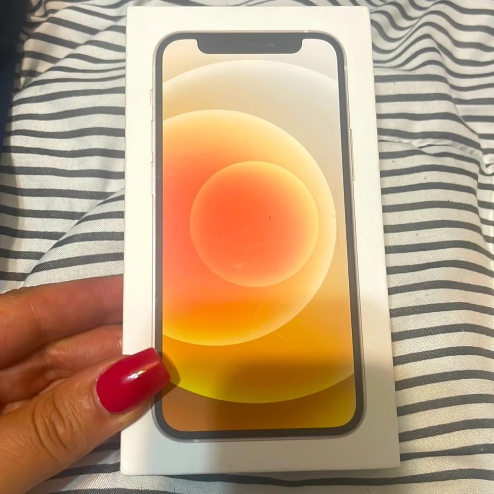 Apple iPhone 12 mini box and USB-C to Lightning Cable. No phone included.
